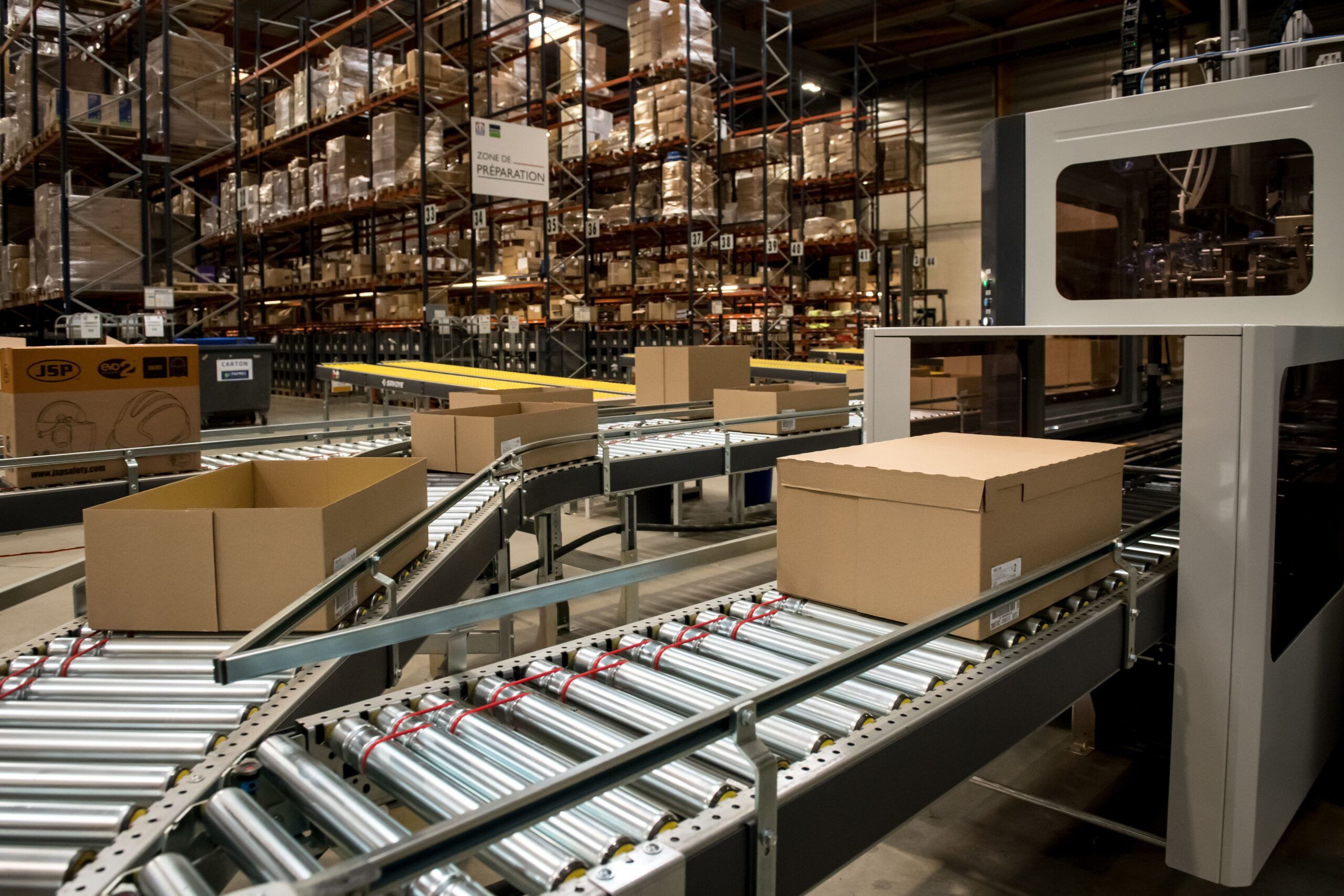 The automated conveyor packing system in the warehouse at France Sécurité facility in Nantes, France